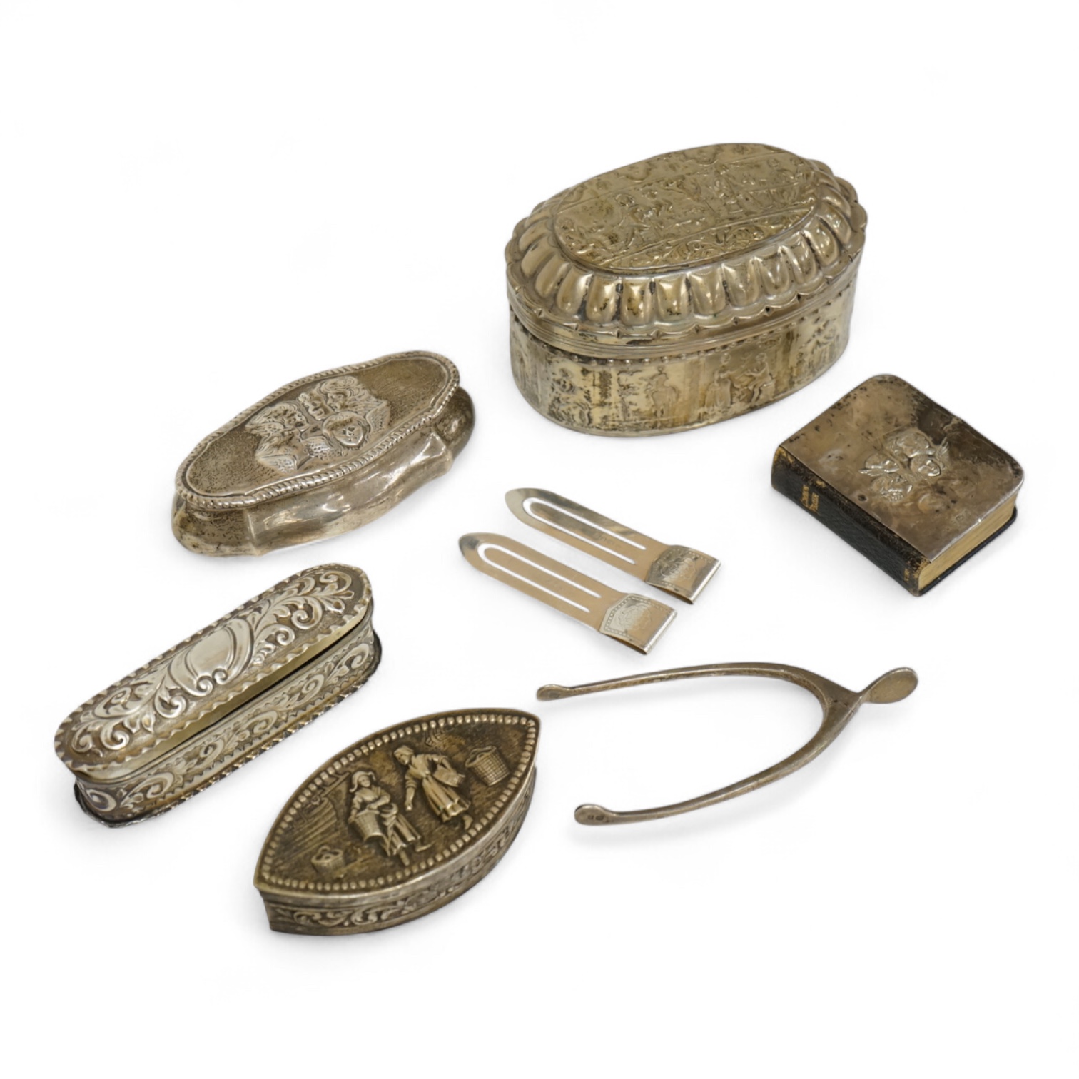 Three late 19th/early 20th century repousse silver trinket boxes, including one with Reynold's Angels decoration, Birmingham, 1899, 91mm, a larger 19th century Dutch white metal oval box and cover, a pair of wishbone sil